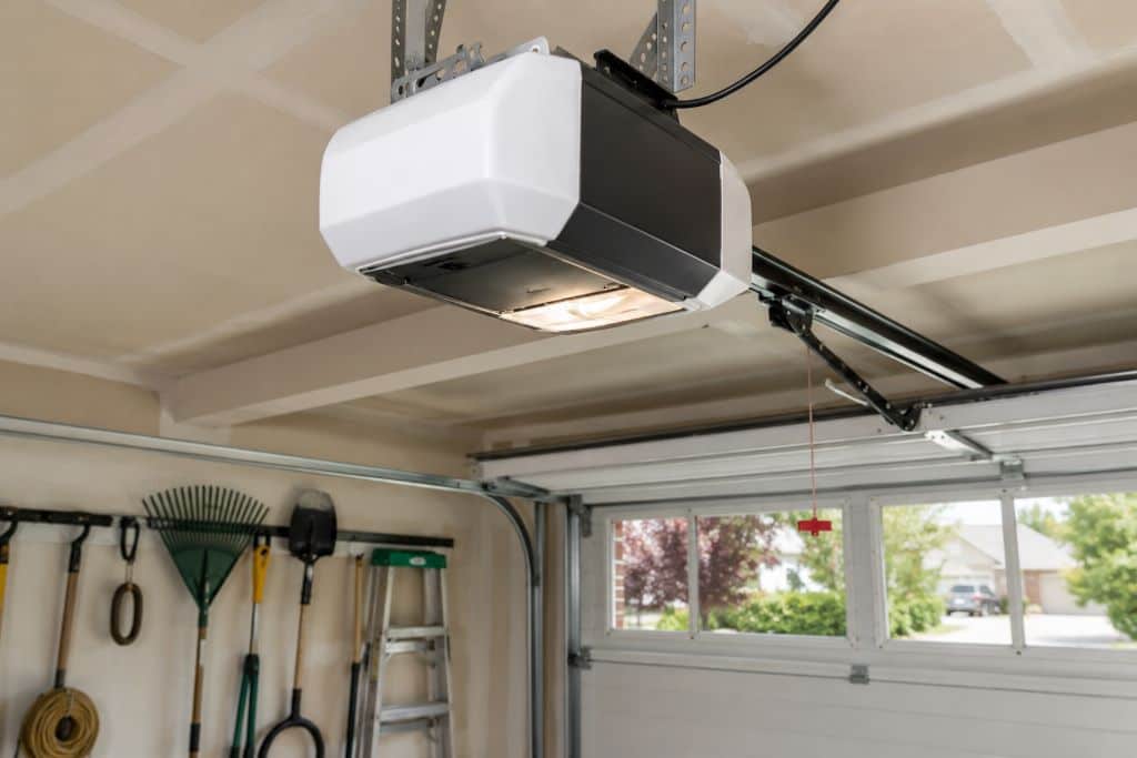 Ceiling-mounted garage door opener installed inside a residential garage in Canoga Park.